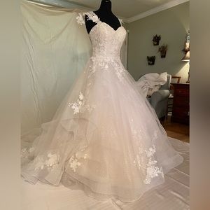 This was my wedding dress. I was pregnant and not able to wear it.